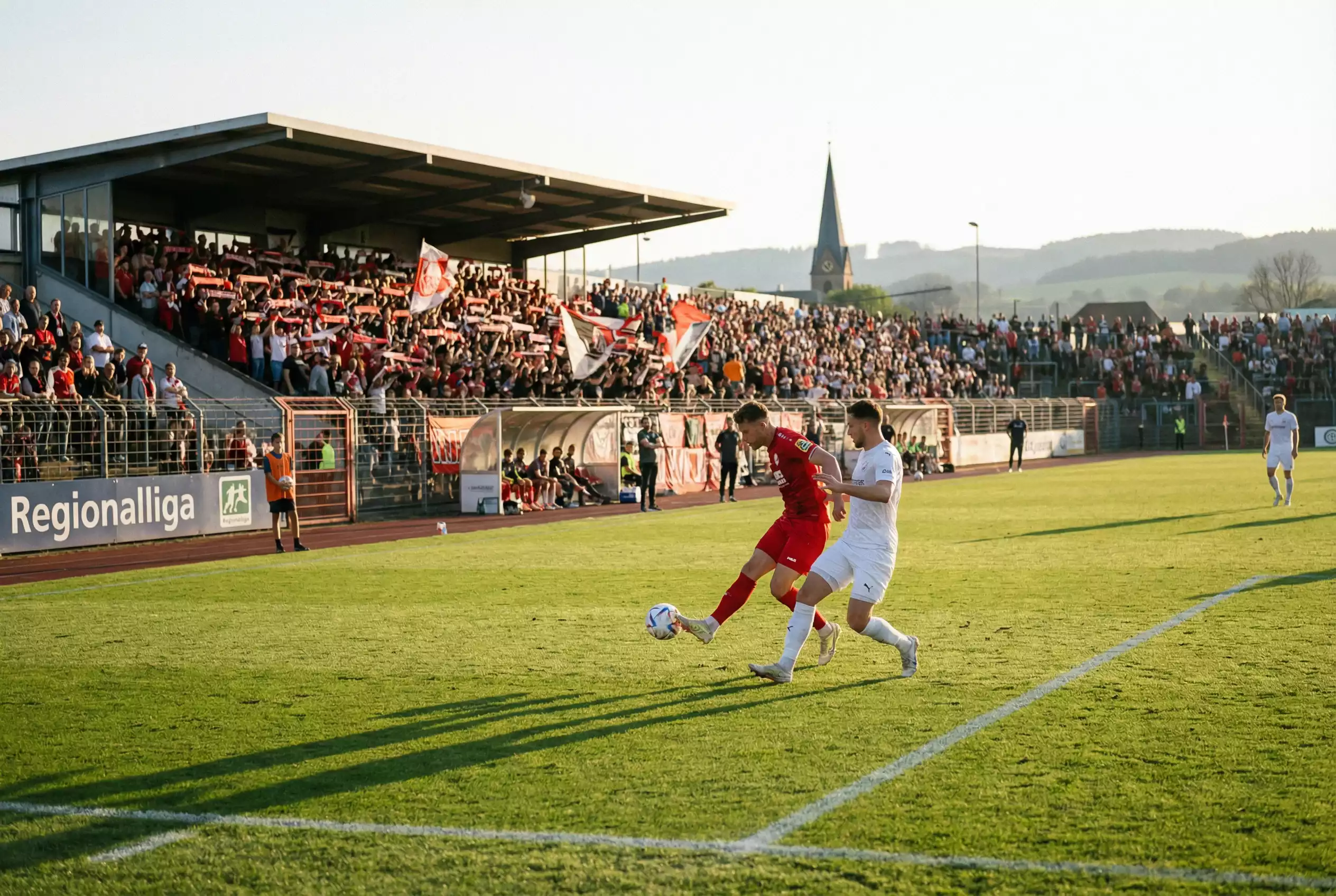 Regionalliga Fußball Wetten in Deutschland - Stadionszene mit Amateur-Fußball